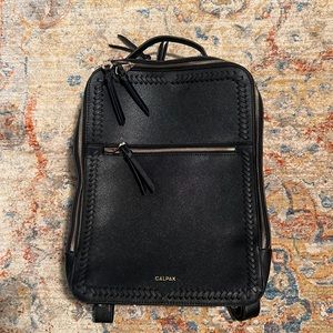 Black and gold Calpak laptop womens bookbag